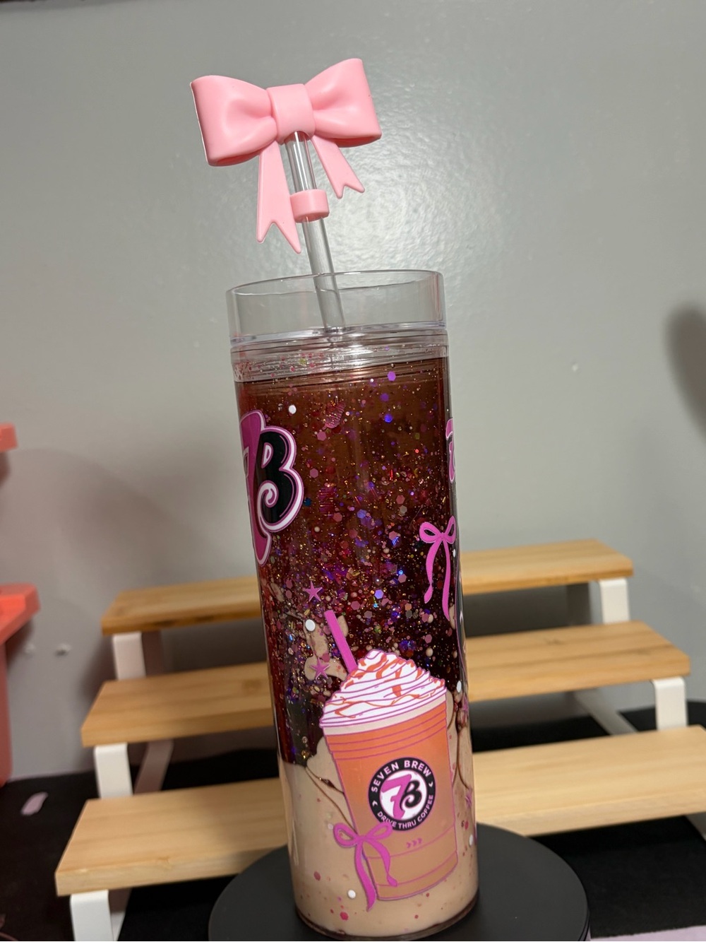 7Brew Pink Glitter Bow Straw Tumbler with iced coffee lava - 16oz